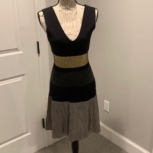Parker sleeveless size medium. Black, gold and silver. New with tags